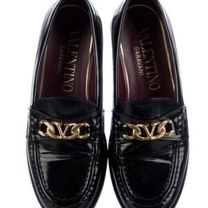 Valentino Garavani Black Patent Leather Loafers with Gold Logo Chain